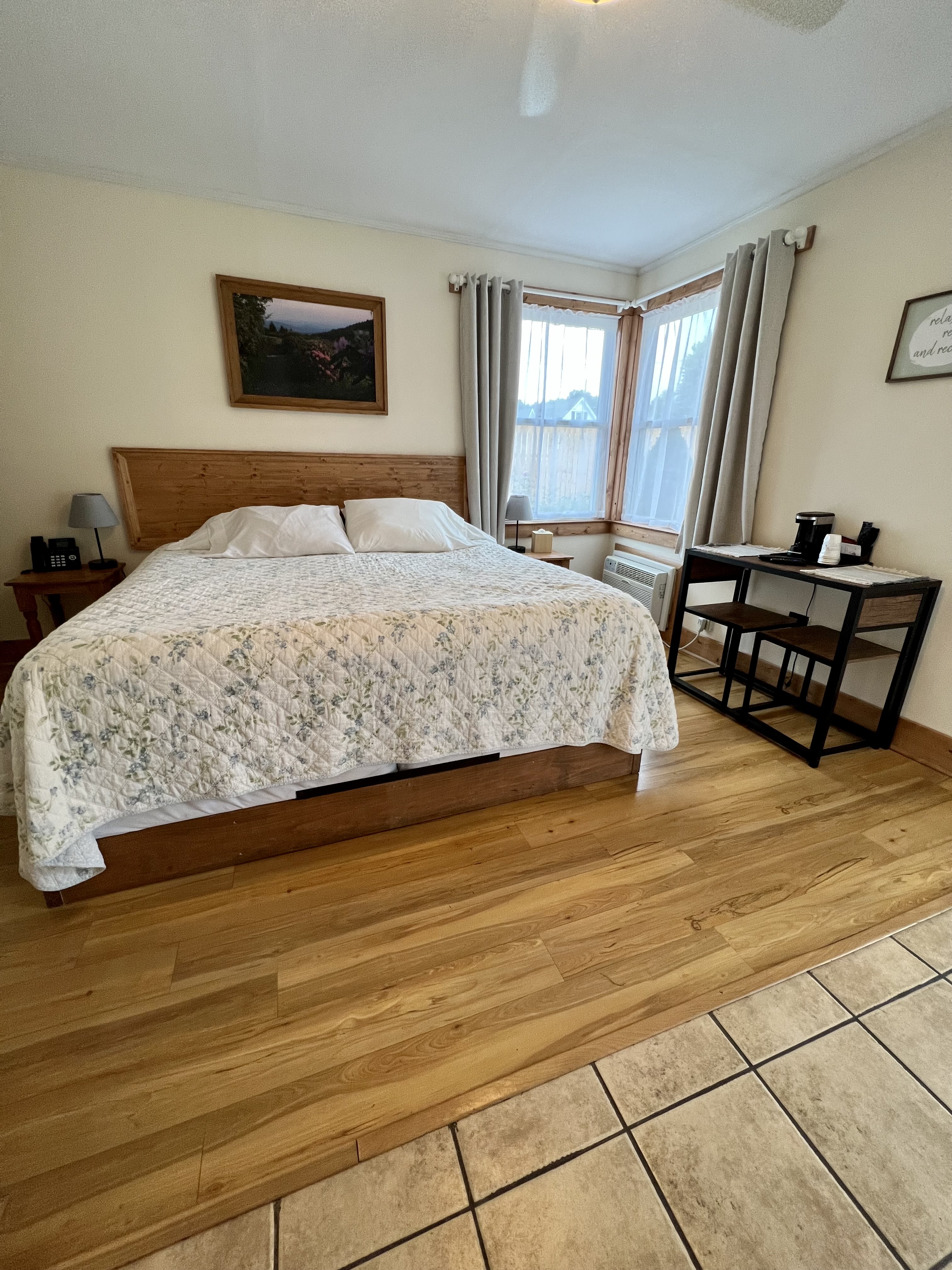 King bed room with kitchenette